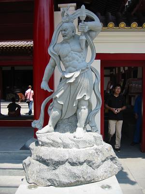 Statue outside Buddha Tooth Temple in Chinatown, Singapore